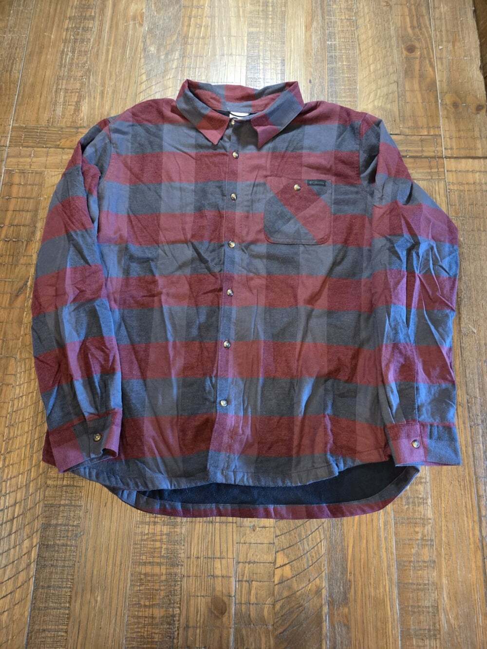 red and grey plaid Columbia fleece-lined flannel shirt jacket